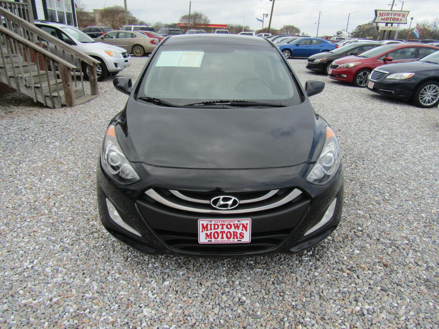 2013 Black Hyundai Elantra GT A/T (KMHD35LE1DU) with an 1.8L L4 16V DOHC engine, 6-Speed Automatic transmission, located at 15016 S Hwy 231, Midland City, AL, 36350, (334) 983-3001, 31.306210, -85.495277 - Photo#1